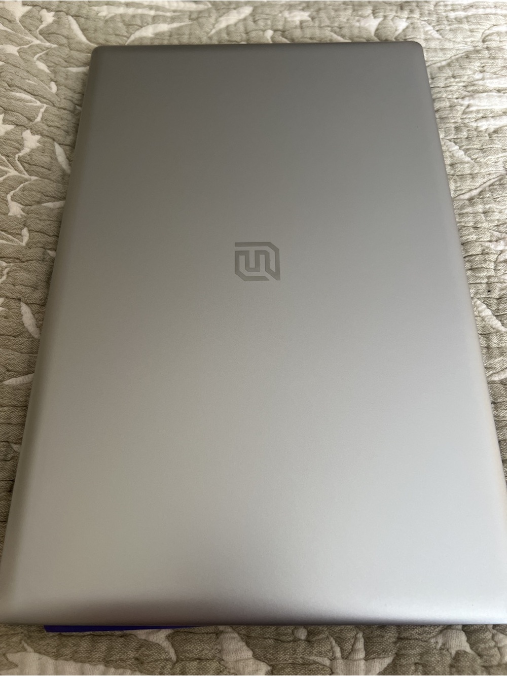 Silver Laptop with Minimal Logo - Modern Portable Computer